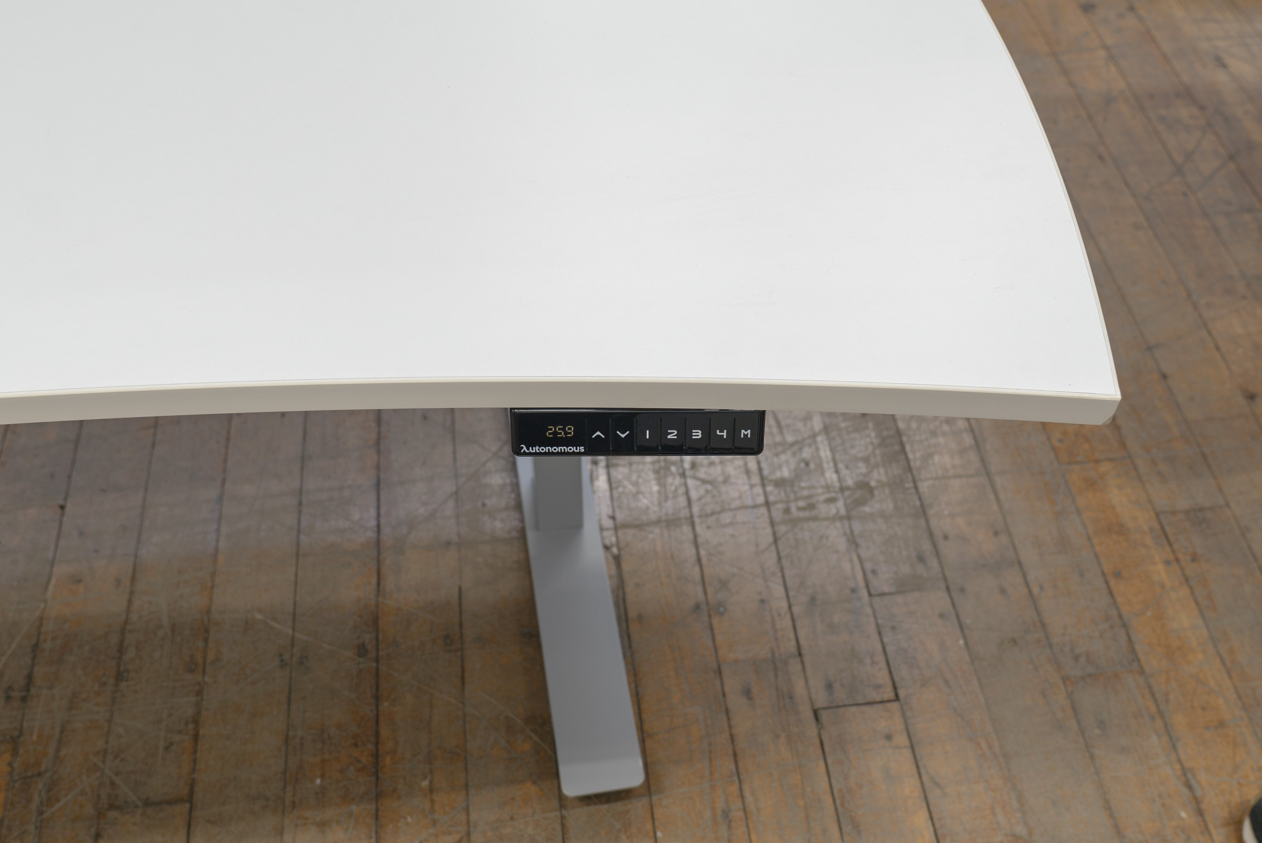 autonomous-crescent-shaped-height-adjustable-sit-to-stand-desks